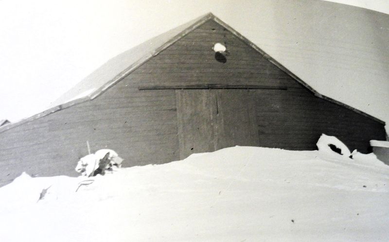 This photo from the 1950s shows the old wooden barn and granary at columnist Jim Goetze's grandfather's place in Wichita County. Goetze took photographs of old pictures in family photo albums.