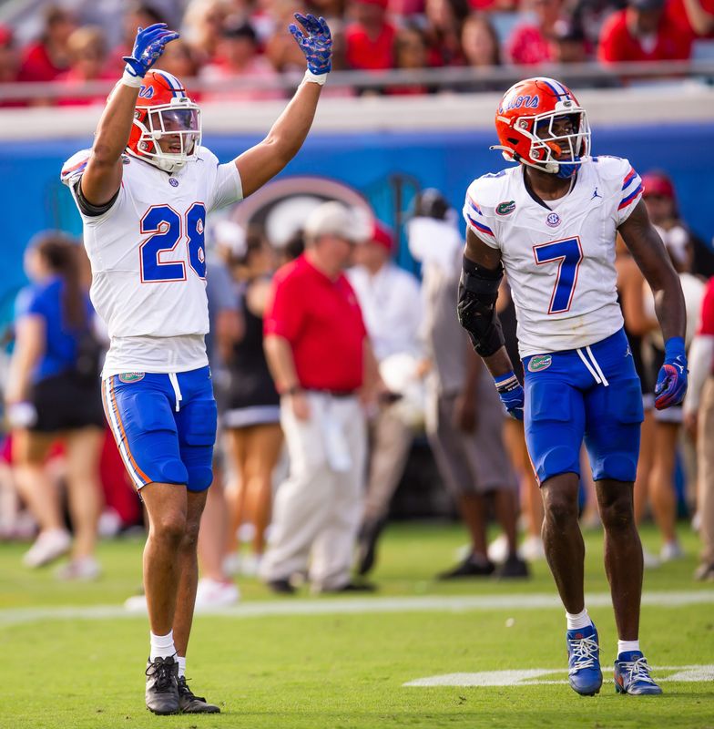 Florida Gators defensive back Devin Moore (28) celebrates his interception during the first half at EverBank Stadium in Jacksonville, FL on Saturday, November 2, 2024. [Doug Engle/Gainesville Sun]