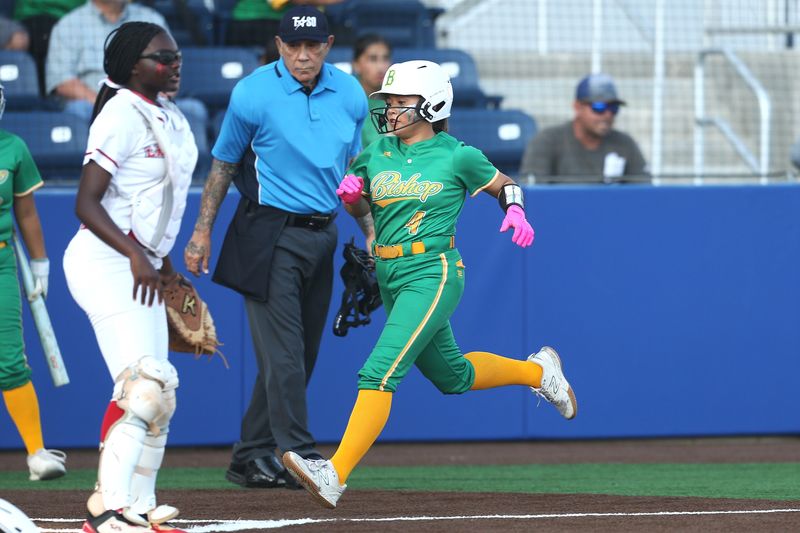 Aubrielle Saldana crosses home plate as Bishop scored three first inning runs in a 12-1 Game 1 win against West Oso in the Class 3A Division I bi-district softball series on Thursday, April 23, 2026 at Gregory-Portland's Wildcat Park.