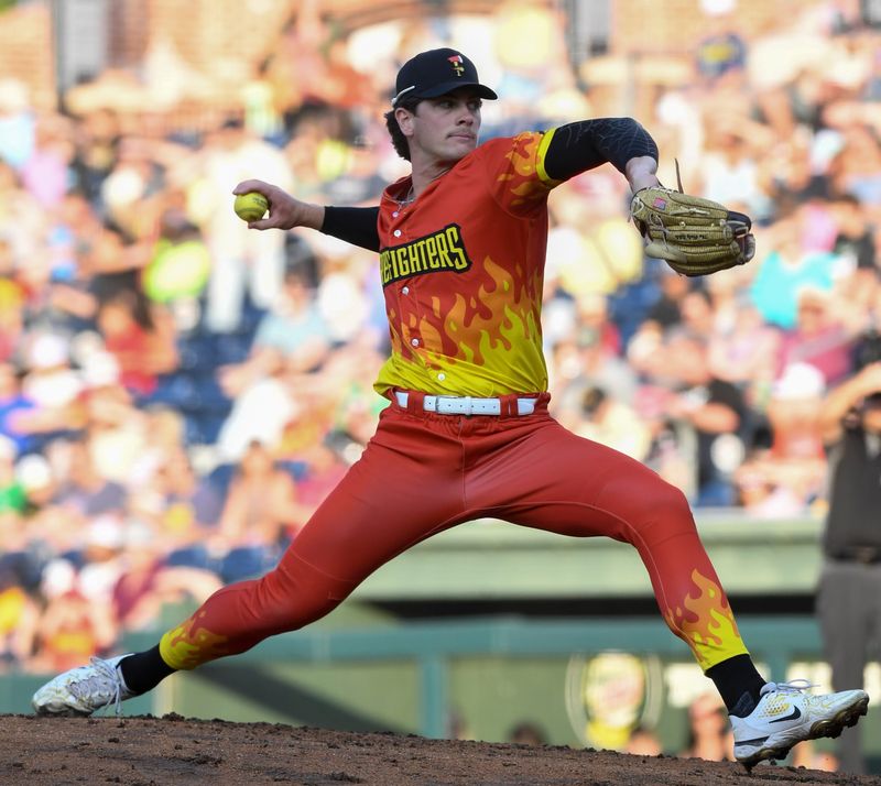 Firefighters pitcher Bradford Webb (42) throws the ball Friday, April 24, 2026, during the Banana Ball World Tour game against the Clowns at Fluor Field in Greenville, South Carolina.