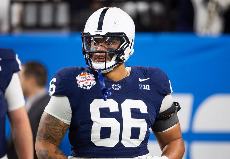 Dec 31, 2024; Glendale, AZ, USA; Penn State Nittany Lions offensive lineman Drew Shelton (66) against the Boise State Broncos during the Fiesta Bowl at State Farm Stadium. Mandatory Credit: Mark J. Rebilas-Imagn Images