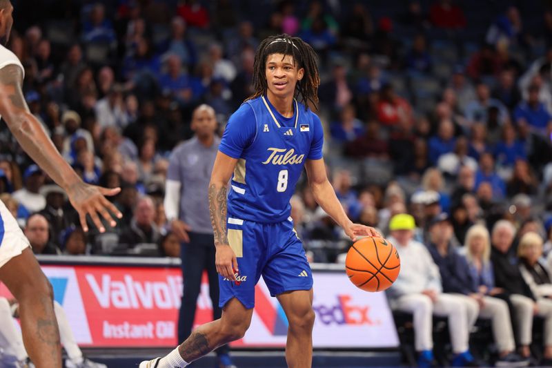 Feb 5, 2025; Memphis, Tennessee, USA; Tulsa Golden Hurricane guard Tyshawn Archie (8) reacts against the Memphis Tigers during the second half at FedExForum. Mandatory Credit: Wesley Hale-Imagn Images