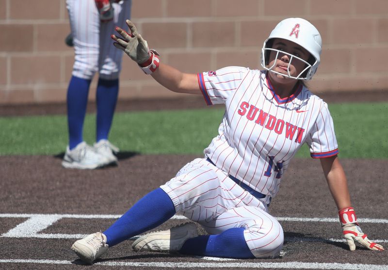 Sundown's Nayleen Morin slides into home against Sudan in Game 2 of a Class 2A Division II bi-district playoff softball series Saturday, April 25, 2026, at the Sundown ISD softball complex in Sundown.