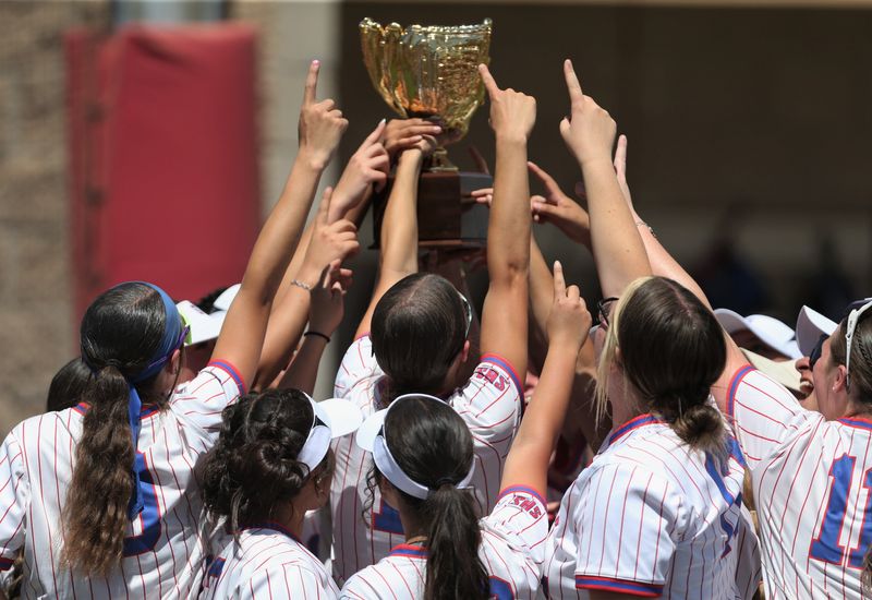 Sundown celebrates with its trophy after a win over Sudan in Game 2 of a Class 2A Division II bi-district playoff softball series Saturday, April 25, 2026, at the Sundown ISD softball complex in Sundown.