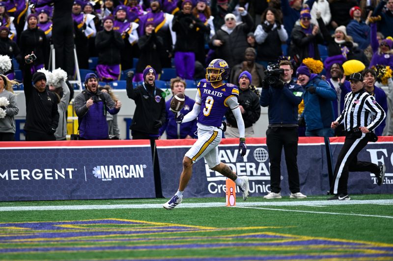 East Carolina Pirates wide receiver Anthony Smith (9) scores a touchdown during the second half of the Military Bowl against the Pittsburgh Panthers at Navy-Marine Corps Stadium.