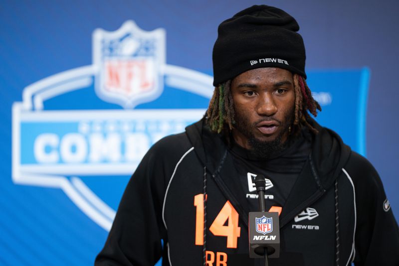 Feb 27, 2026; Indianapolis, IN, USA; Texas A&M running back Le'Veon Moss (RB14) speaks to members of the media during the NFL Combine at the Indiana Convention Center. Mandatory Credit: Jacob Musselman-Imagn Images