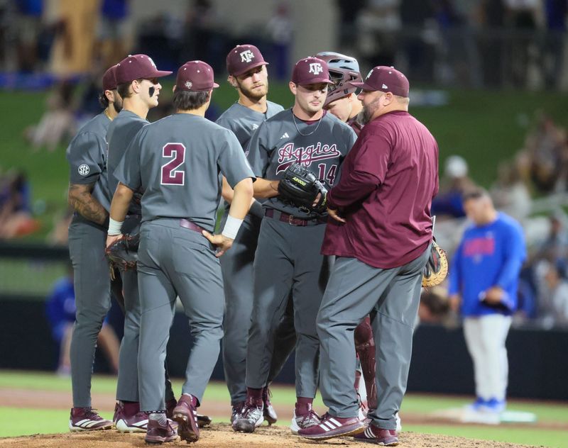 Texas A&M has a mound conference during an NCAA baseball game against Florida at Condron Family Ballpark at Alfred A. McKethan Field in Gainesville, FL on Friday, April 24, 2026. [Alan Youngblood/Gainesville Sun]