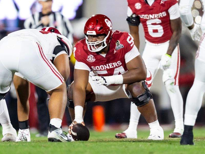 Dec 19, 2025; Norman, OK, USA; Oklahoma Sooners offensive lineman Febechi Nwaiwu (54) against the Alabama Crimson Tide during the CFP National Playoff First Round at Gaylord Family Oklahoma Memorial Stadium. Mandatory Credit: Mark J. Rebilas-Imagn Images