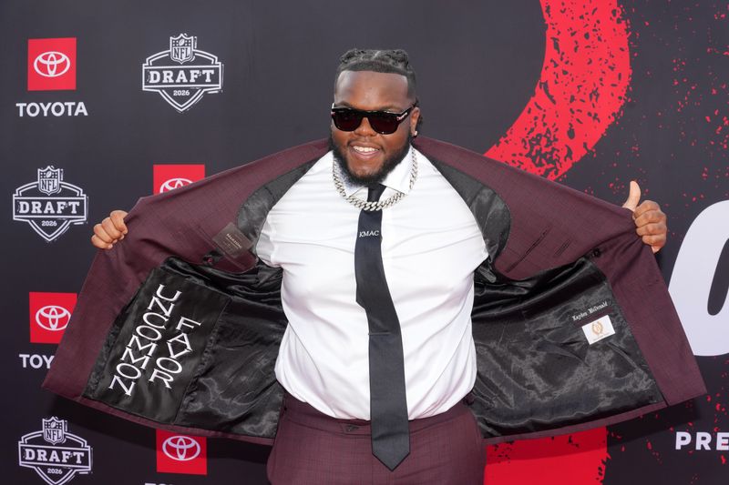 Apr 23, 2026; Pittsburgh, PA, USA; Ohio State Buckeyes defensive tackle Kayden McDonald poses on the red carpet before the 2026 NFL Draft at Point State Park. Mandatory Credit: Kirby Lee-Imagn Images