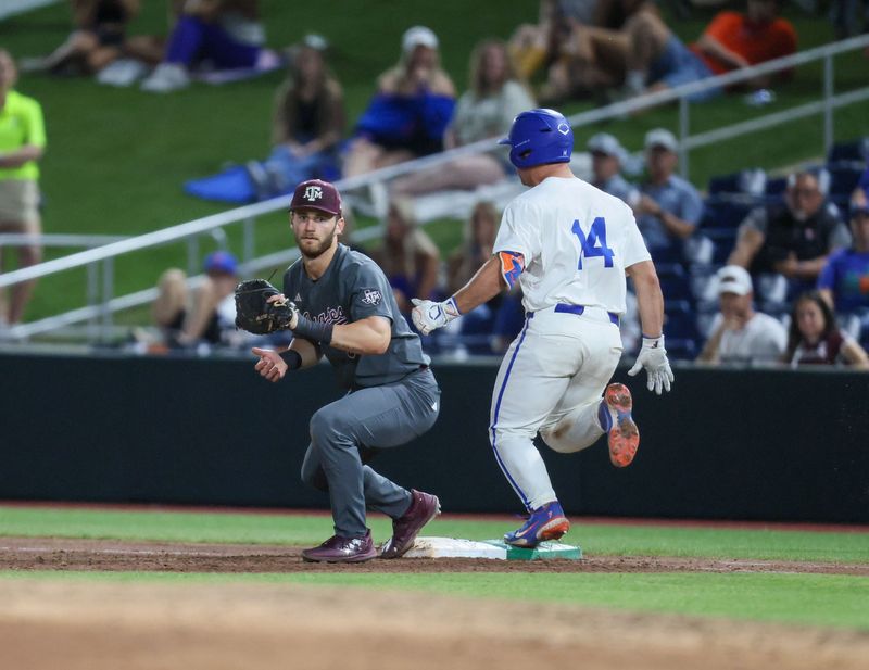 Texas A&M infielder Gavin Grahovac (9) gets Florida catcher Karson Bowen (14) out at first during an NCAA baseball game at Condron Family Ballpark at Alfred A. McKethan Field in Gainesville, FL on Friday, April 24, 2026. [Alan Youngblood/Gainesville Sun]
