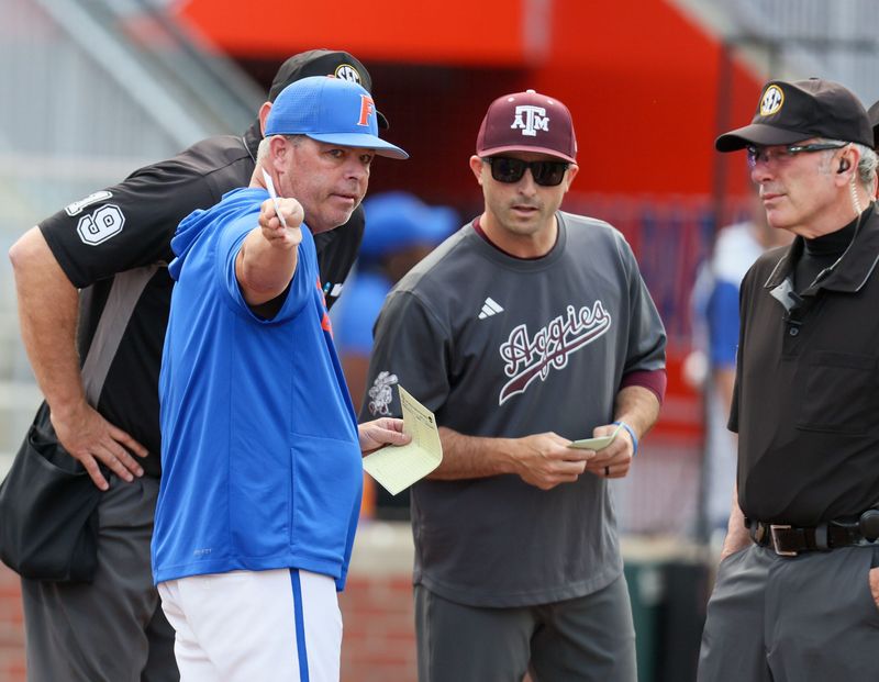 Florida head coach Kevin O'Sullivan talks with Texas A&M head coach Michael Earley before an NCAA baseball game at Condron Family Ballpark at Alfred A. McKethan Field in Gainesville, FL on Friday, April 24, 2026. [Alan Youngblood/Gainesville Sun]