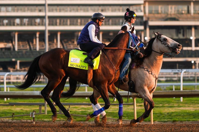 Pony rider Danielle Rosier leads jockey Mike Smith and 2026 Kentucky Derby contender So Happy during morning training at Churchill Downs. April 24, 2026.