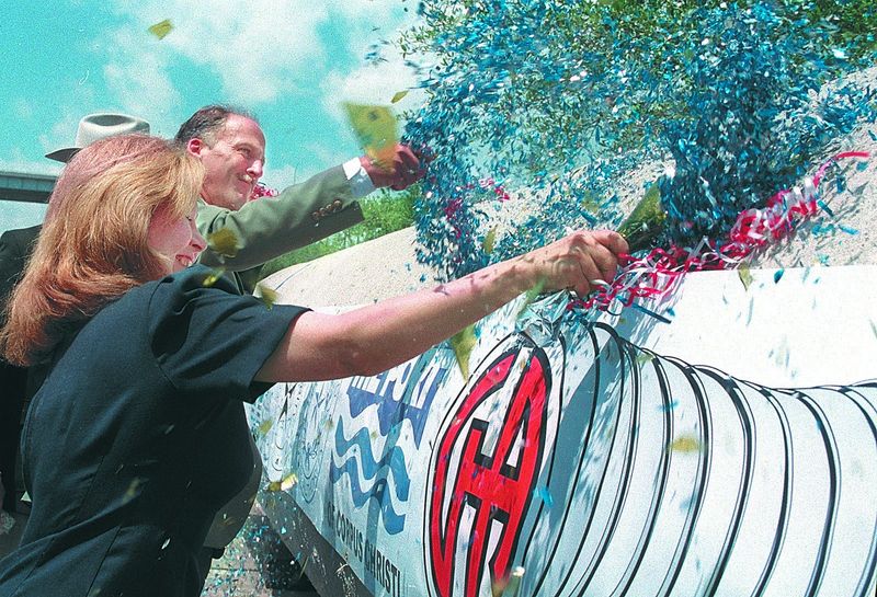 In this April 12, 1997, archive photo, then-Mayor Mary Rhodes is shown with a break-away bottle christening a section of pipeline that would be used as a conduit between Edna and Corpus Christi for Lake Texana water. Also pictured is Bill Dodge, chairman of the Port of Corpus Christi.