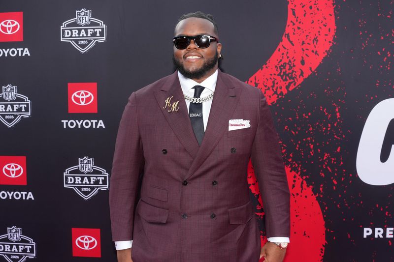 Apr 23, 2026; Pittsburgh, PA, USA; Ohio State Buckeyes defensive tackle Kayden McDonald poses on the red carpet before the 2026 NFL Draft at Point State Park. Mandatory Credit: Kirby Lee-Imagn Images