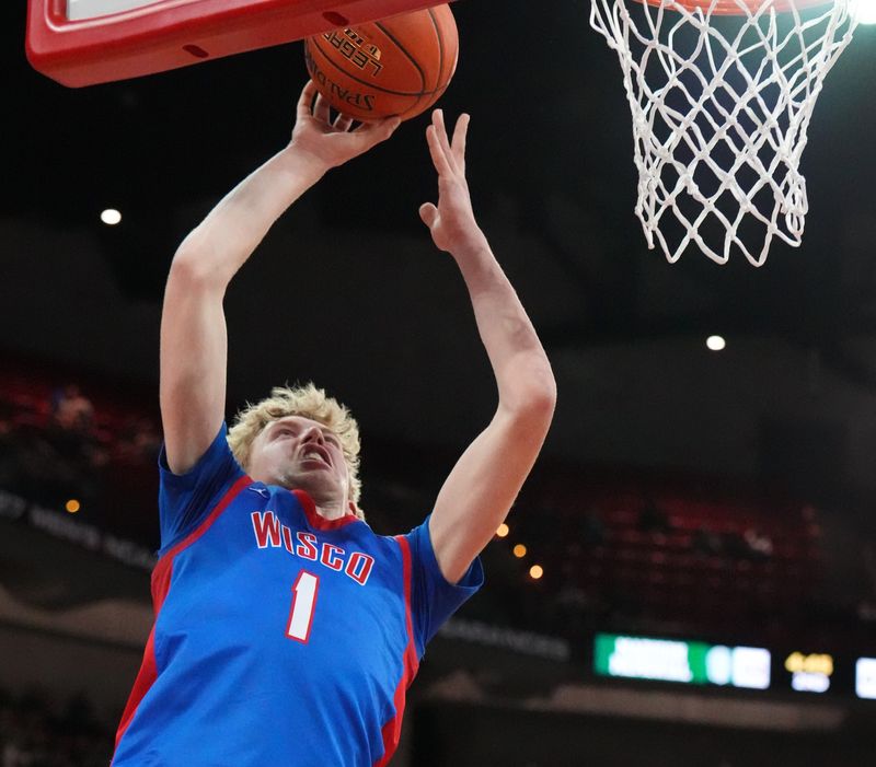 Wisconsin Lutheran's Kager Knueppel (1) elevates for two against Madison Memorial during the WIAA Division 1 boys state championship basketball game on Saturday, March 21, 2026, at the Kohl Center in Madison, Wisconsin. Wisconsin Lutheran won the game, 57-37.