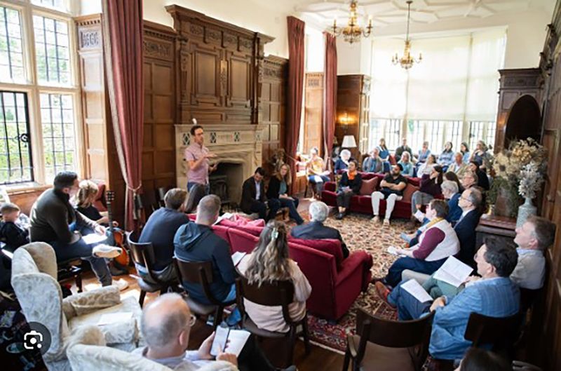 A theological group meets at Yarnton Manor near Oxford, England, an activity of the Lanier Theological Library and Learning Centre.