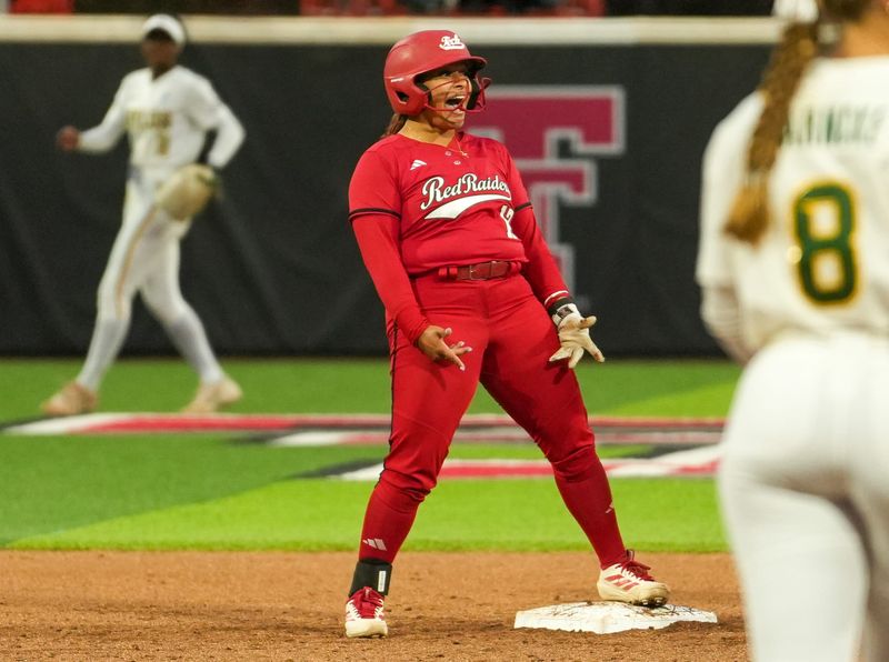 Texas Tech's Jasmyn Burns reacts to a hit against Baylor during a Big 12 Conference softball game, Friday, May 1, 2026, at Tracy Sellers Field.