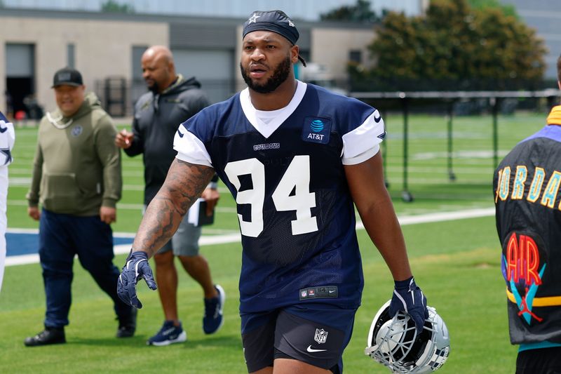 May 1, 2026; Frisco, TX, USA; Dallas Cowboys defensive tackle Kevin Gilliam (94) walks off the field after practice at the Ford Center at the Star Training Facility in Frisco, Texas. Mandatory Credit: Chris Jones-Imagn Images