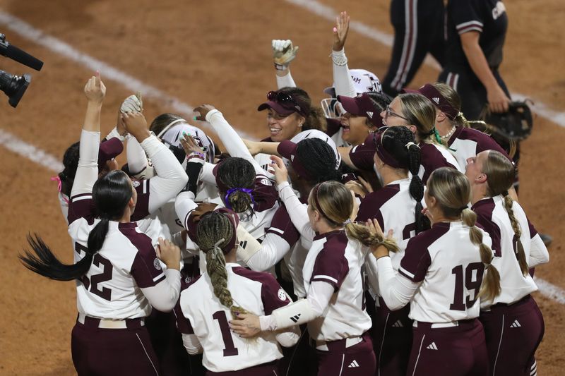 May 8, 2025; Athens, GA, USA; Texas A&M teammates react to the win after a game against South Carolina at Jack Turner Stadium. Mandatory Credit: Mady Mertens-Imagn Images