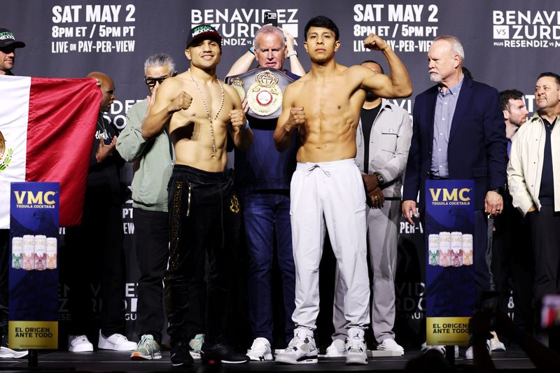 Armando Resendiz and Jaime Munguia pose on stage after ceremonial weigh ins ahead of their WBA super middleweight title fight at T-Mobile Arena in Las Vegas on May 2, 2026.