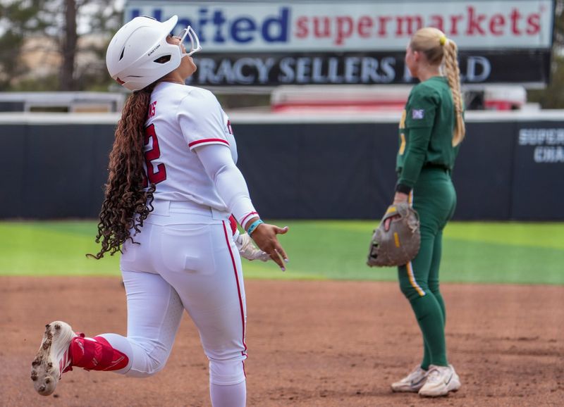 Texas Tech's Jasmyn Burns reacts to hitting a grand slam against Baylor during a Big 12 Conference softball game, Saturday, May 2, 226, at Tracy Sellers Field.