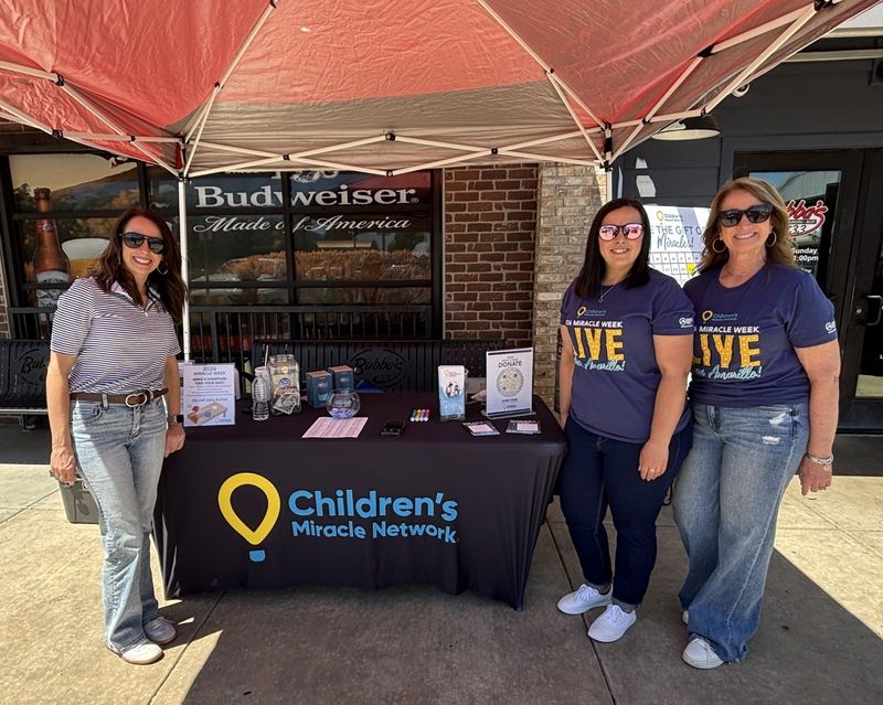 Volunteers for Children's Miracle Network in Amarillo ask patrons to mention a donation when paying for a meal at Bubba's 33 on Saturday, May 2, where a portion of the proceeds went toward children with expensive medical treatments and other costs.