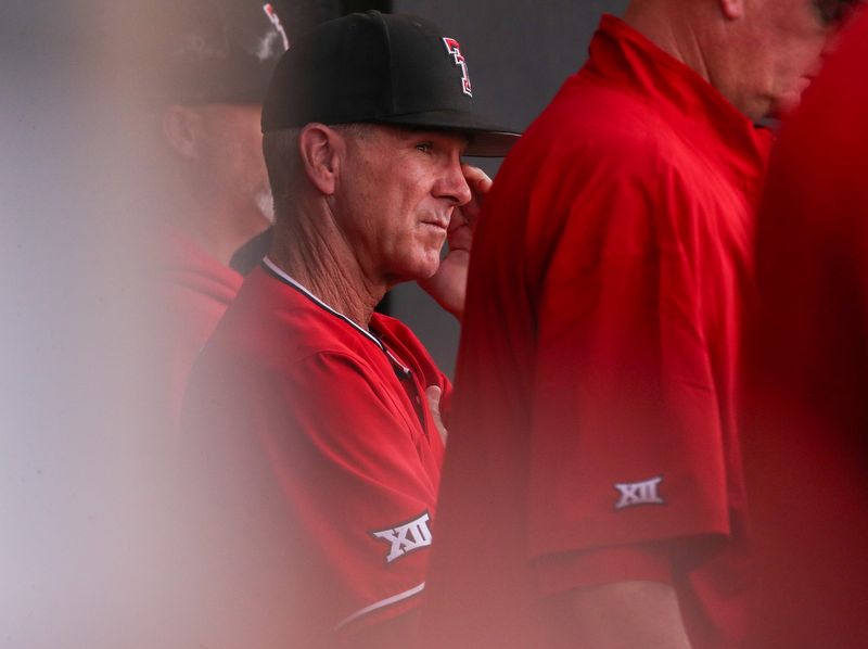 Texas Tech head coach Tim Tadlock looks on from the dugout during a non-conference Division I baseball game, Tuesday, March 31, 2026, at Rip Griffin Park.