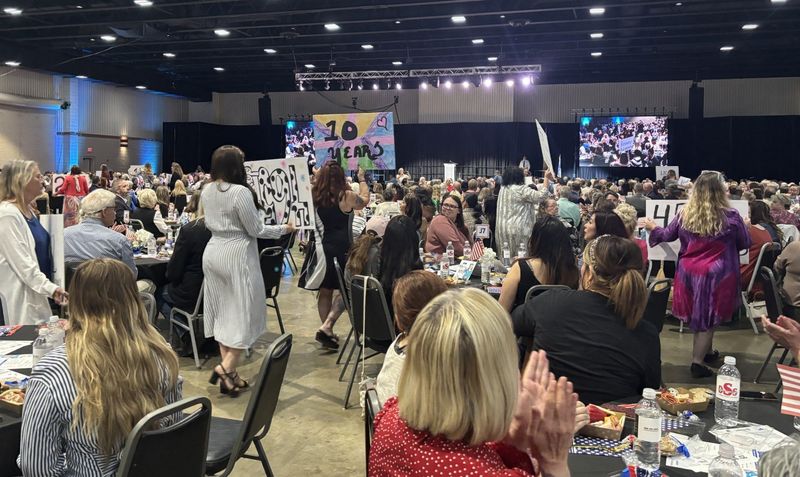 Women celebrating freedom from addiction at Downtown Women's Center luncheon on May 5 tell of their pathway to recovery.