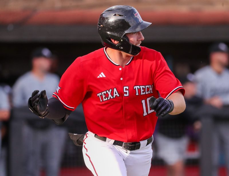 Texas Tech's Logan Hughes runs to first after an at-bat against Abilene Christian during a non-conference Division I baseball game, Tuesday, March 31, 2026, at Rip Griffin Park.