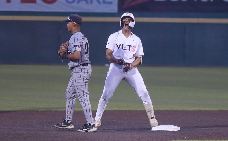 Veterans Memorial's Jordan Garza gets fired up at second base after giving the Eagles the lead in the fourth inning of Game 1 of the area round series against PSJA North on Thursday, May, 7, at Cabaniss Baseball Field in Corpus Christi.