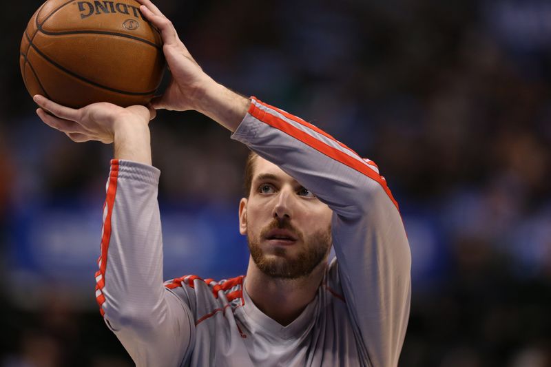 Mar 6, 2013; Dallas, TX, USA; Houston Rockets center Tim Ohlbrecht shoots prior to the game against the Dallas Mavericks at the American Airlines Center. Mandatory Credit: Matthew Emmons-USA TODAY Sports