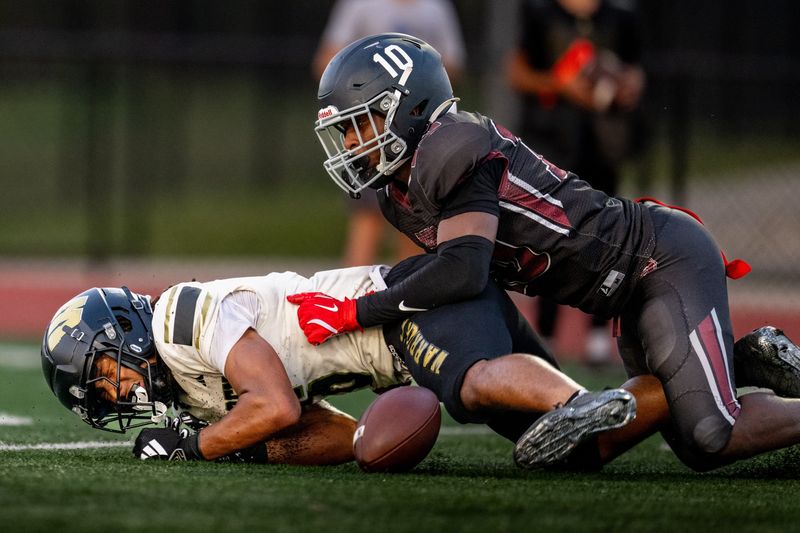 Lawrence Central High School Errol Kerns (10) breaks up a pass intended for Warren Central High School junior Zechariah Wallace (6) during the first half of an IHSAA varsity football game, Friday, Sept. 12, 2025, at Lawrence Central High School.