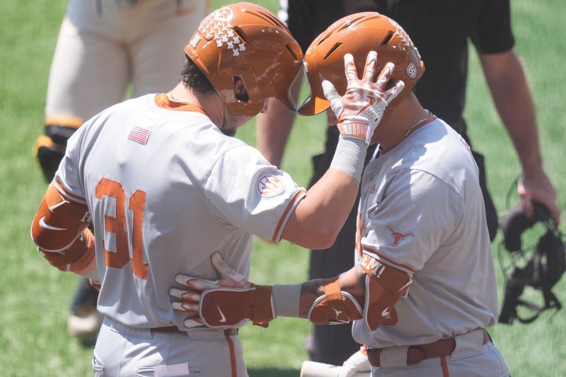 Texas' Casey Borba (31) and Ethan Mendoza (5) celebrate Borbaâ€™s home run against Tennessee in an NCAA college baseball game on May 10, 2026, in Knoxville, Tennessee.
