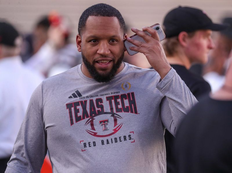 General manager James Blanchard works the phone during the Texas Tech football team's spring game, Friday, April 17, 2026, at Jones AT&T Stadium.