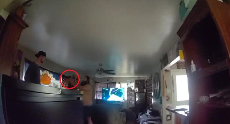 Lubbock police officials released images documenting 31-year-old Westley Russell brandishing a firearm at a patrol officer who was escorting Russell's ex-girlfriend as she retrieving her property from their home.