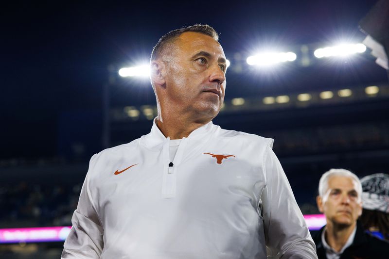 Texas Longhorns coach Steve Sarkisian is interviewed by the media after the game against the Kentucky Wildcats at Kroger Field.