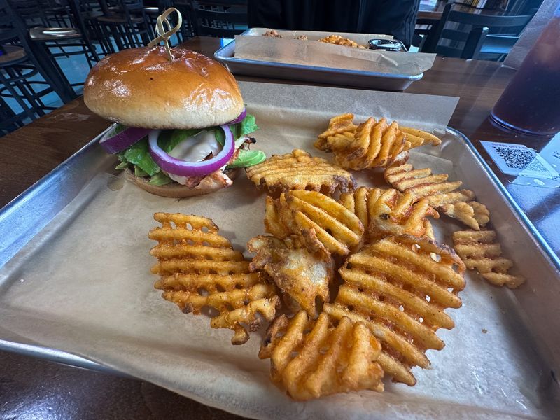 A grilled chicken sandwich at Wings N Taps, located at 5802 Yorktown Blvd. in Corpus Christi, is pictured on May 1.