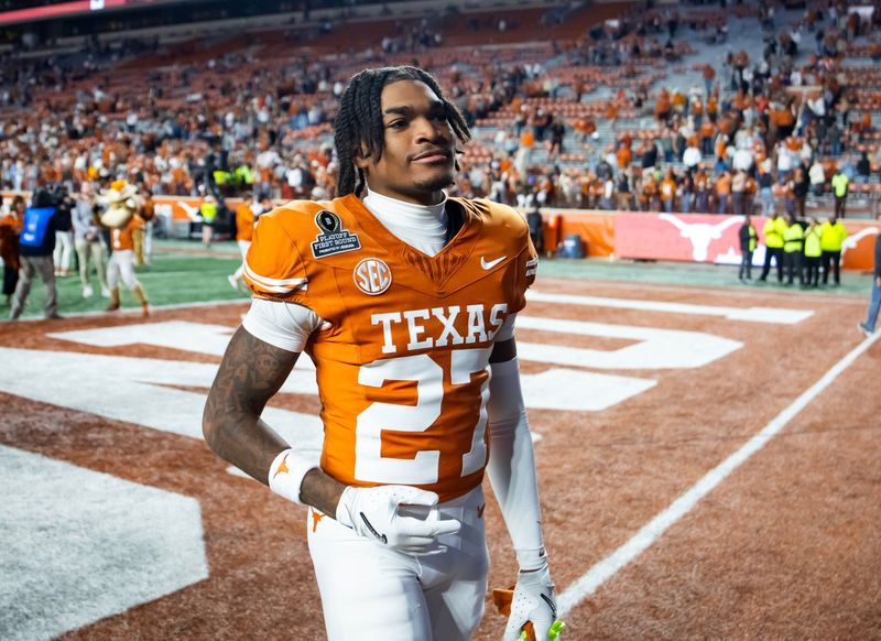 Dec 21, 2024; Austin, Texas, USA; Texas Longhorns defensive back Wardell Mack (27) against the Clemson Tigers during the CFP National playoff first round at Darrell K Royal-Texas Memorial Stadium. Mandatory Credit: Mark J. Rebilas-Imagn Images