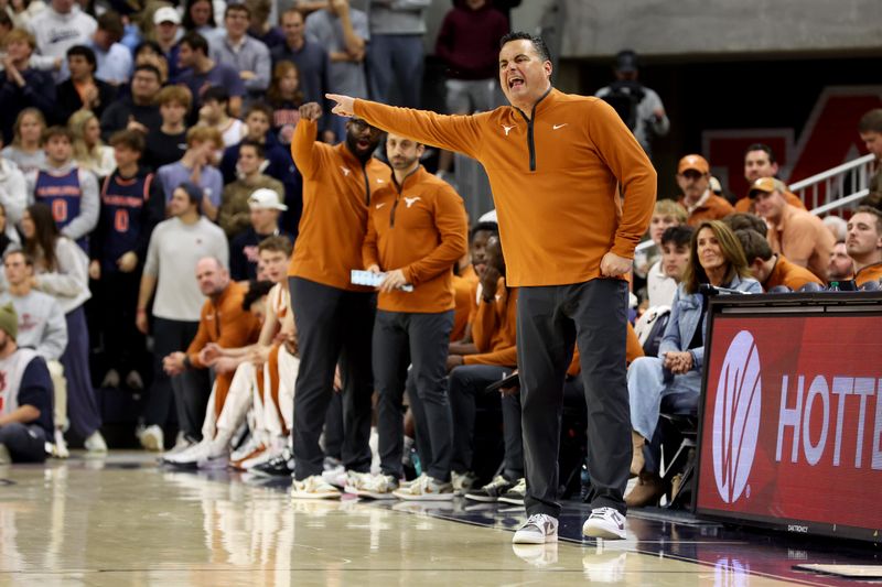 Jan 28, 2026; Auburn, Alabama, USA; Texas Longhorns head coach Sean Miller directs his team during the second half against the Auburn Tigers at Neville Arena. Mandatory Credit: John Reed-Imagn Images