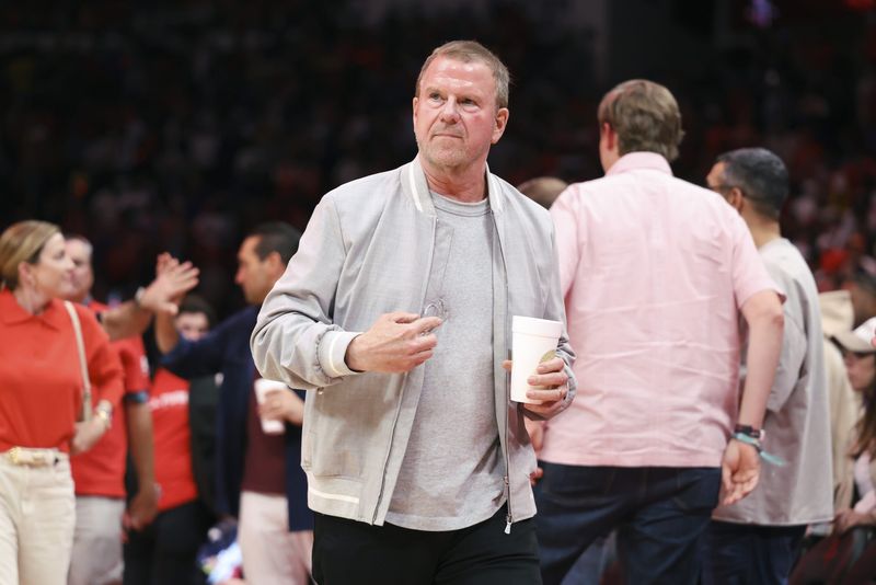Apr 24, 2026; Houston, Texas, USA; Houston Rockets owner Tilman Fertitta walks on the court during the fourth quarter against the Los Angeles Lakers during game three of the first round of the 2026 NBA Playoffs at Toyota Center. Mandatory Credit: Troy Taormina-Imagn Images