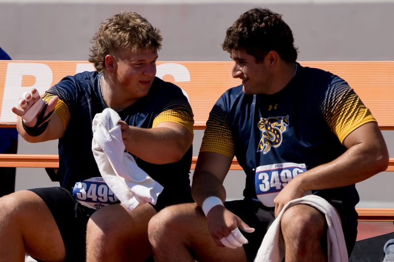 Stephenville’s Kolton Dearth and Caleb Garland talk before competing in shot put during the Class 4A UIL State track and field meet on May 14, 2026, at Mike A. Myers Stadium in Austin, Texas.