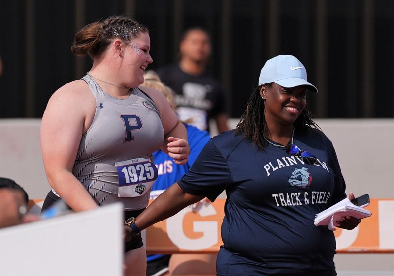 Plainview's Ava Rushing talks with throws coach Wykiesha Thompson during the Class 5A girls shot put at the UIL state track and field meet Friday, May 15, 2026, at Mike A. Myers Stadium in Austin.