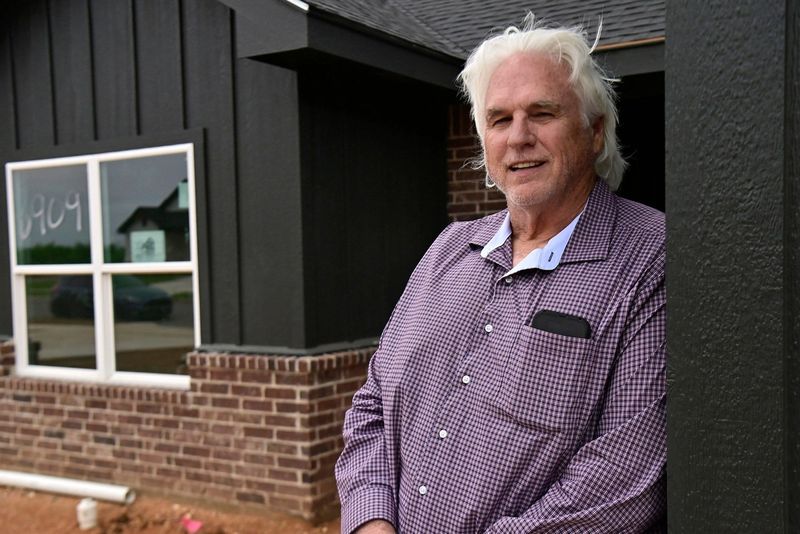 Gene Lantrip stands outside one of his homes in south Abilene Tuesday April 21, 2026. Housing has become a concern in the community as data center workers and an upcoming expanded mission at Dyess Air Force Base mean a tighter supply of residential options.