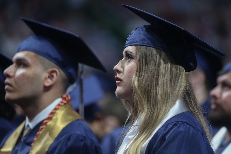 Del Mar College graduates listen to the keynote speaker's speech at the spring commencement on May 15.