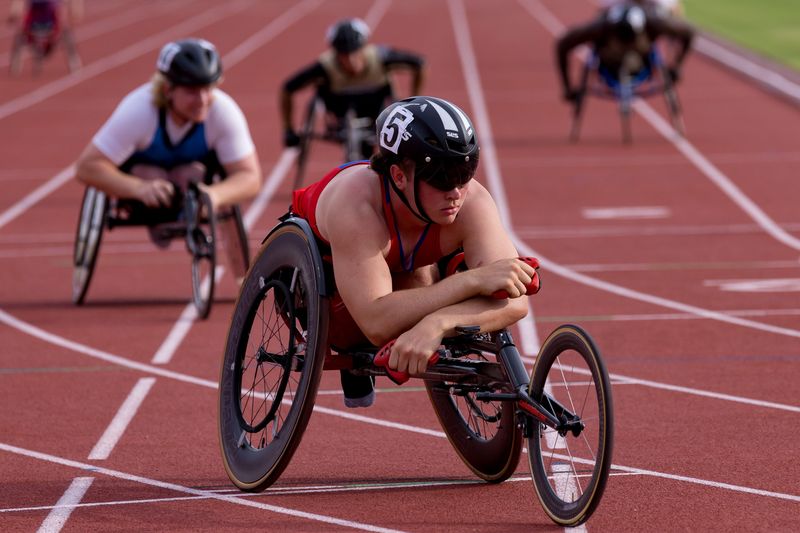 Coahoma’s Kohen Grantom crosses the finish line first in the boys wheelchair 100-meter dash during the UIL State track and field meet on May 15, 2026, at Mike A. Myers Stadium in Austin, Texas.