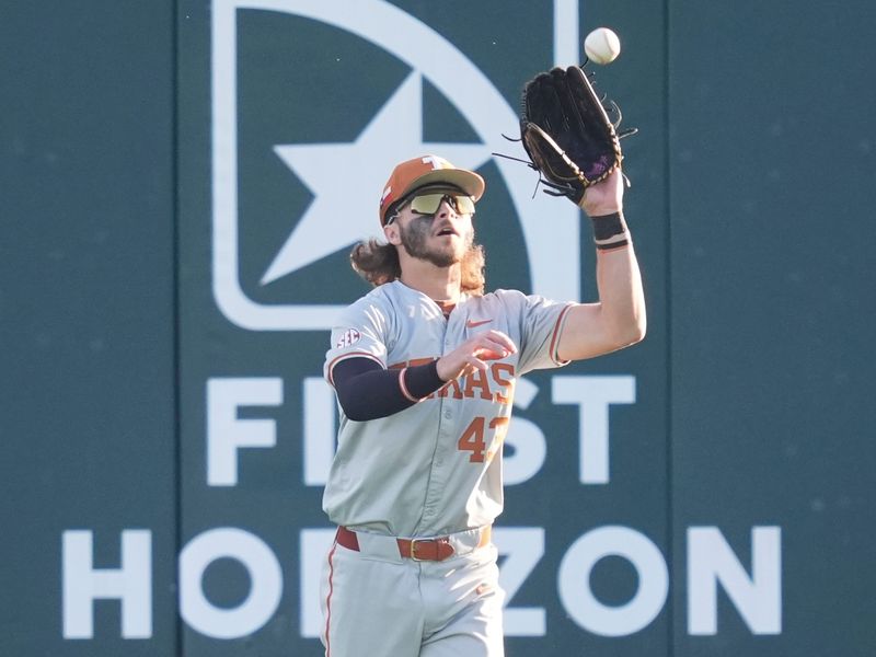 Texas' Aiden Robbins (43) makes a catch in the outfield during the NCAA college baseball game against Tennessee in Knoxville, Tennessee on May 8, 2026.