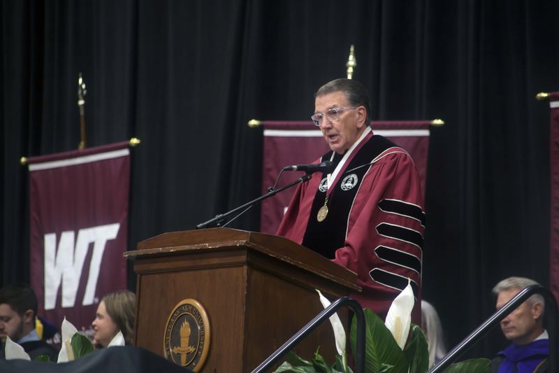 University President Dr. Walter Wendler gives words of encouragement to graduating students during the West Texas A&M University commencement ceremony in Canyon on Friday, May 15. The ceremony was one of four held by the university over the weekend for the Class of 2026.