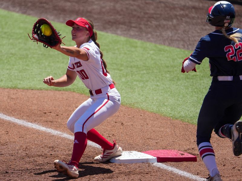 Texas Tech's Jackie Lis catches an out at first against Ole Miss during the Lubbock Regional of the NCAA Division I softball tournament, Saturday, May 16, 2026, at Tracy Sellers Field.