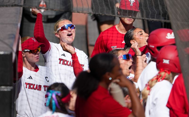 Texas Tech players cheer in the dugout against Ole Miss during the Lubbock Regional of the NCAA Division I softball tournament, Saturday, May 16, 2026, at Tracy Sellers Field.