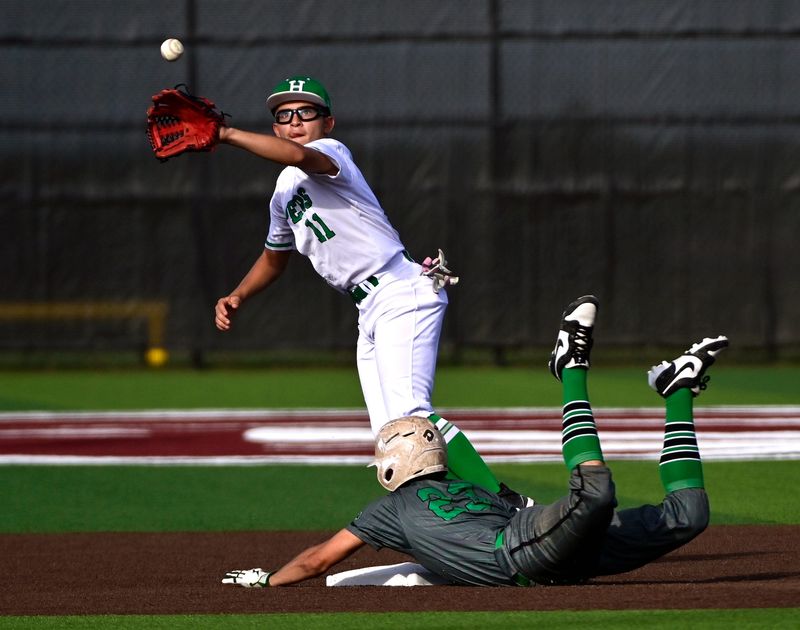 May’s Jackson Lusk is safe at second base as Hamlin’s Zane Leonard catches the ball during Game 2 of the Class 1A Reg. 1 regional semifinal in Eula Thursday May 14, 2026. Hamlin won 4-3, clinching the Pipers’ victory in the series as Regional Semifinal Champions.